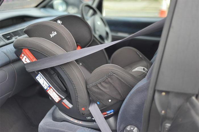 Placing the car seat in the car