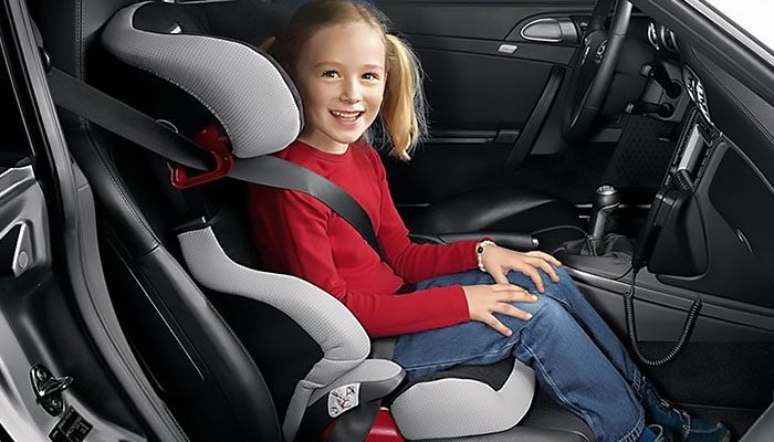 Is it possible to carry a child in a car seat in the front seat?
